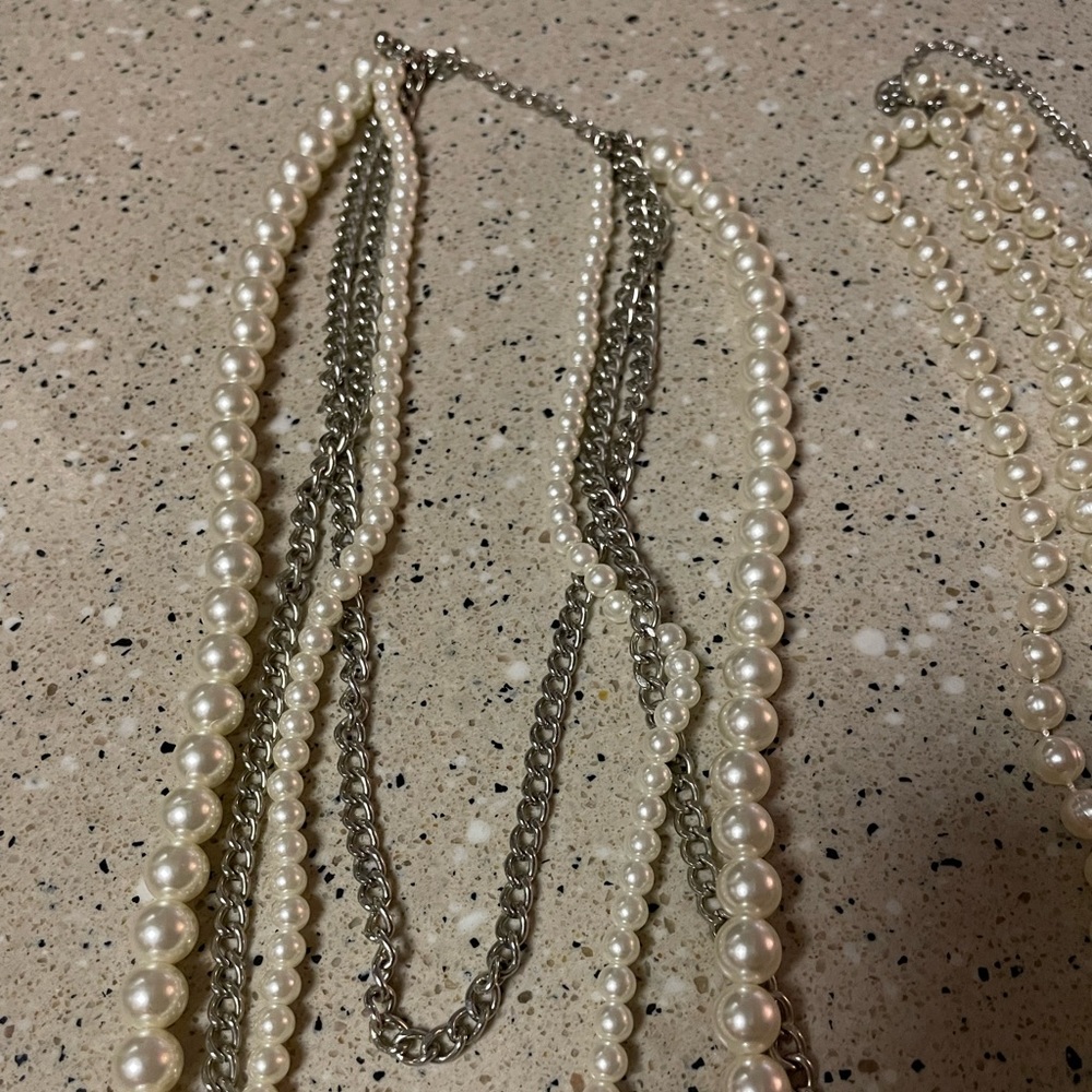 Two long faux pearl strands